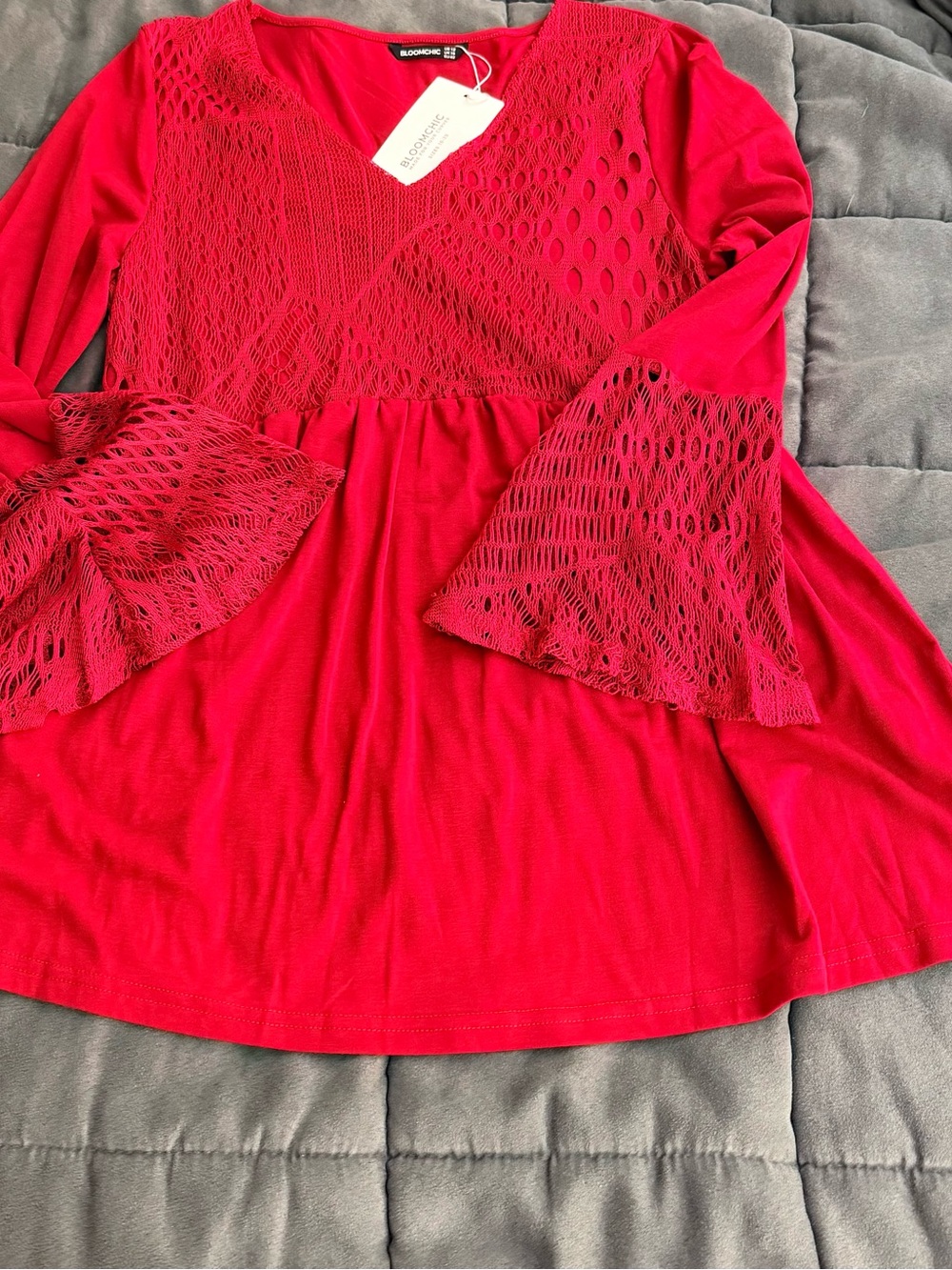 BloomChic size 12 red top with bell sleeves. NWT